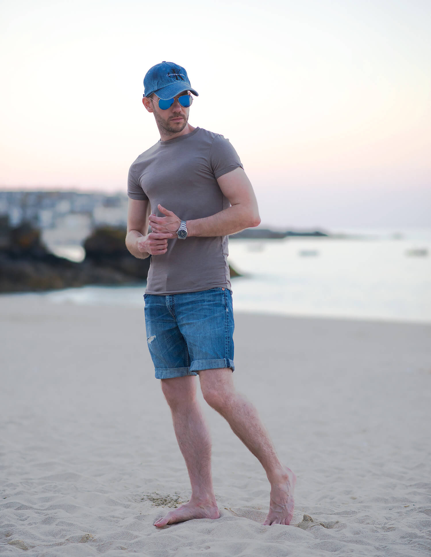 men's denim shorts on beach