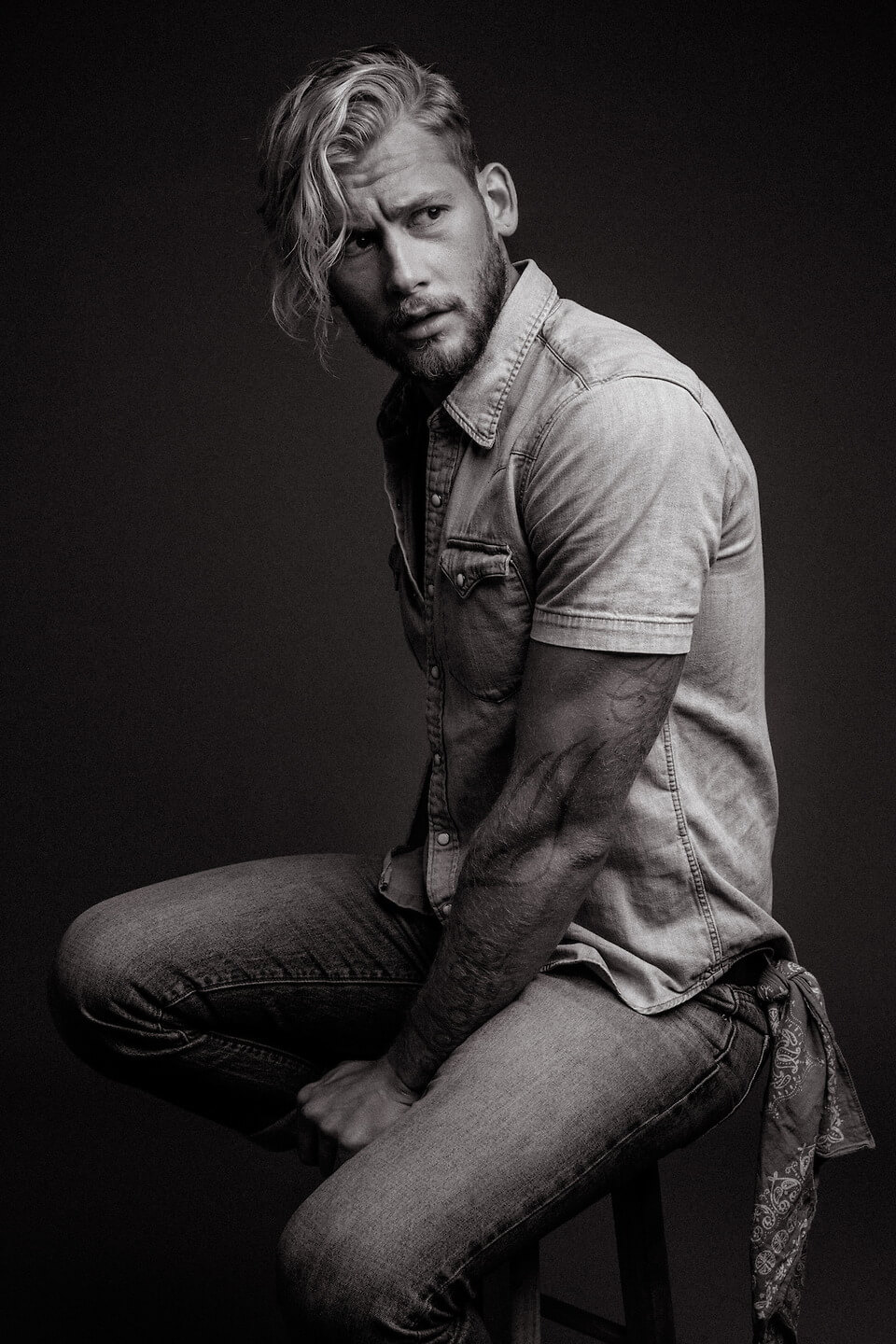male model poses for photography