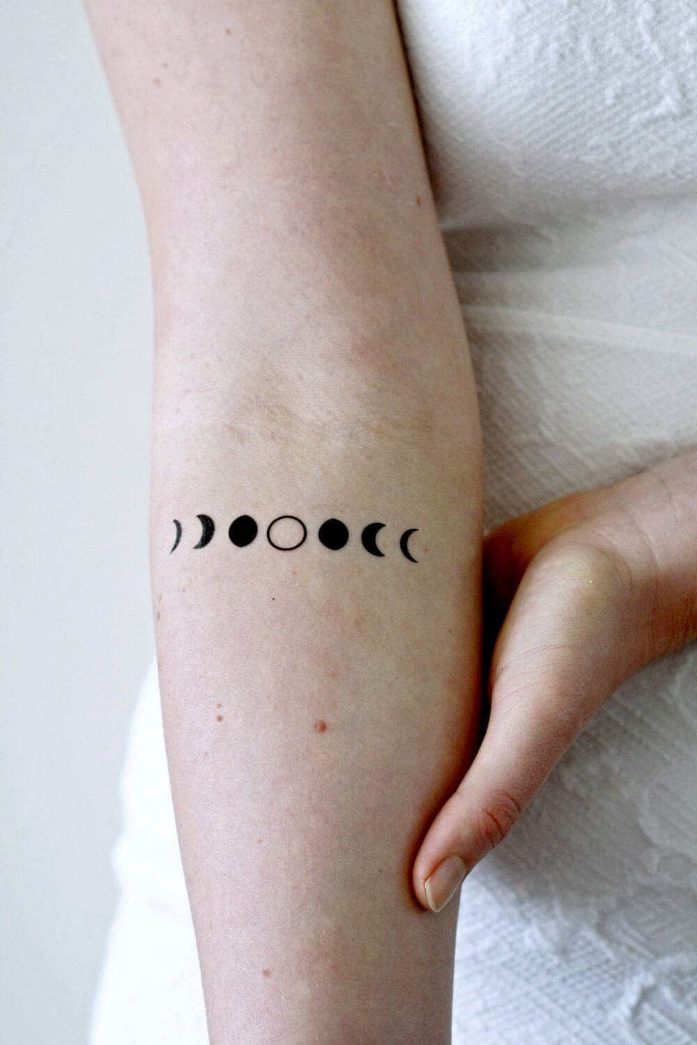 Phases of Moon tattoo - small tattoo ideas