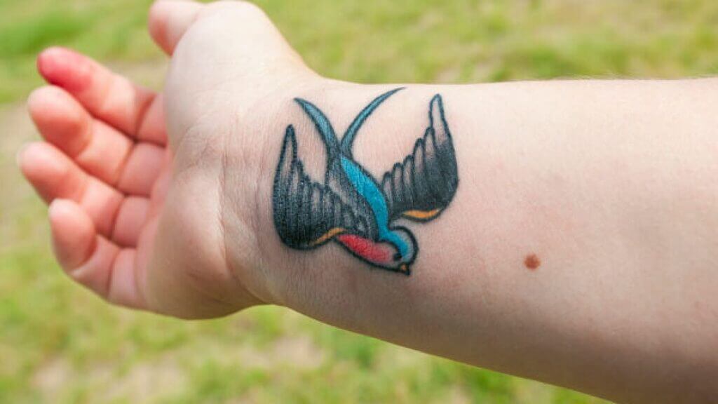 Bird Tattoo: american traditional tattoo 2021