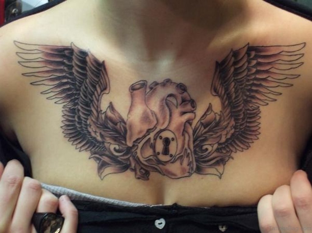 freehand chest piece grenade heart wings by Trevor Smith TattooNOW