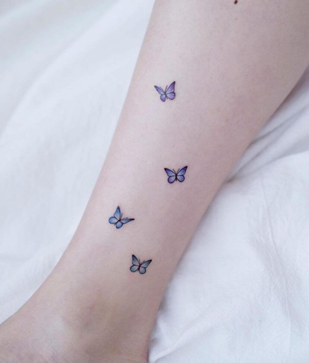butterfly with flowers tattoo