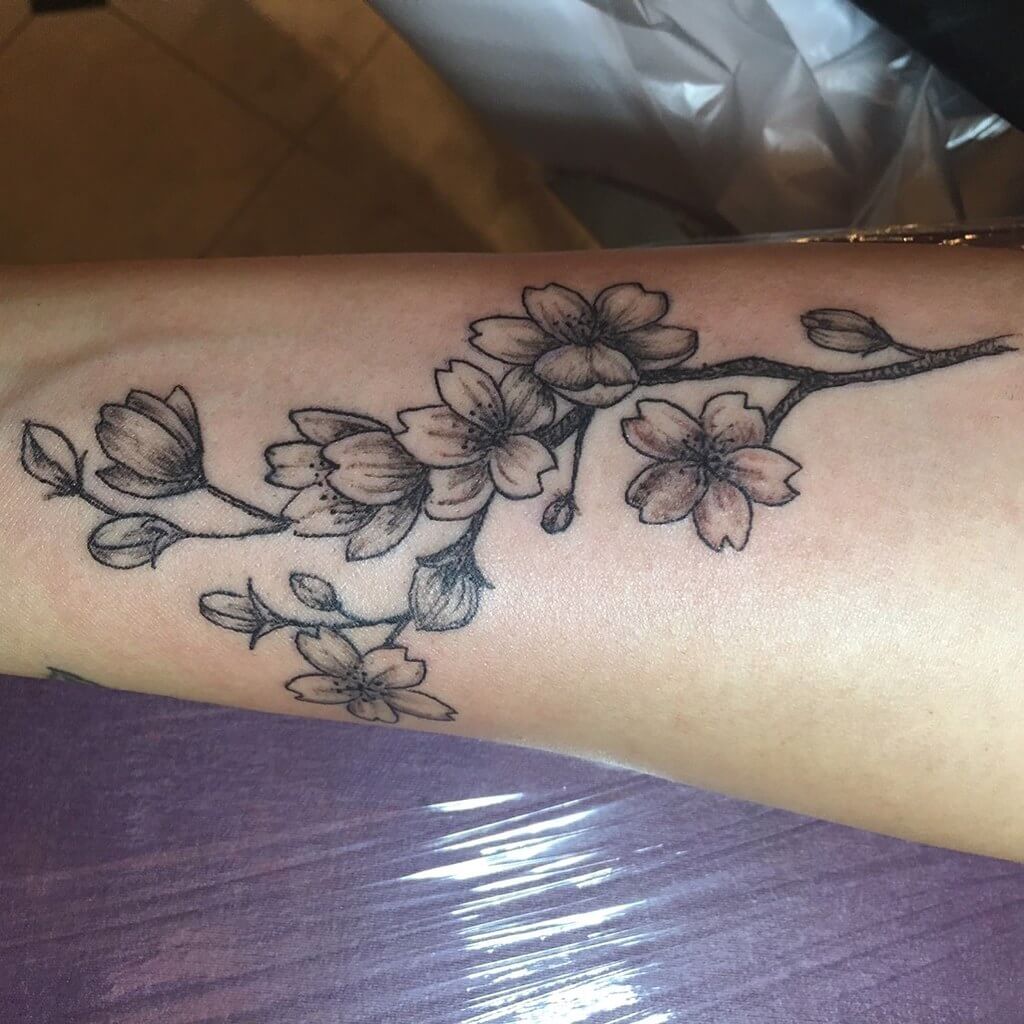 feminine cherry blossom tattoo
