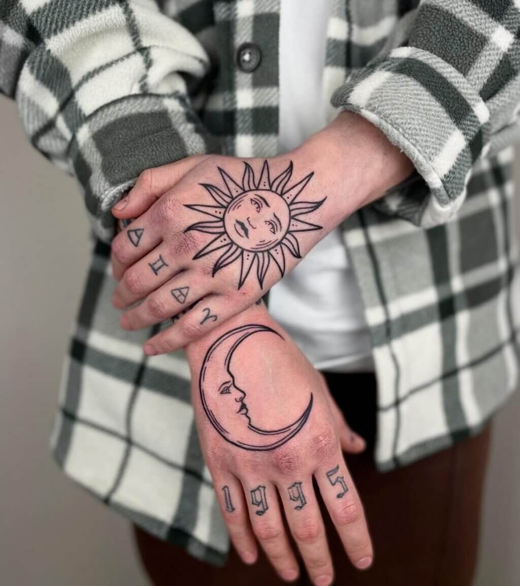 Tatuagens de mão do sol e da lua para homens