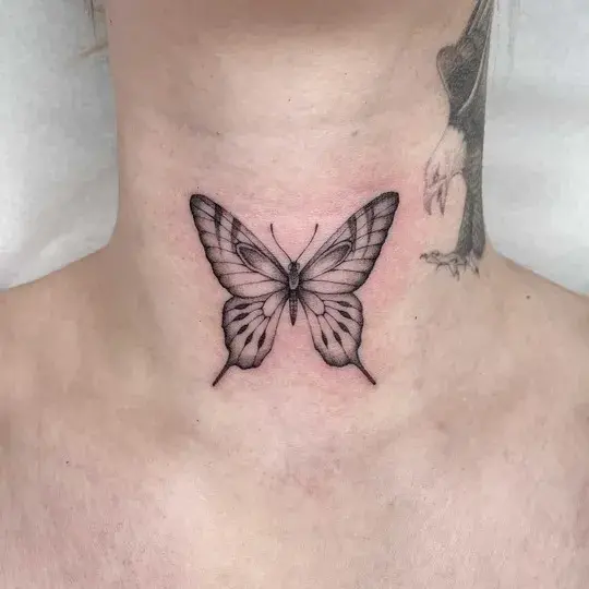 Classic butterfly front neck tattoo