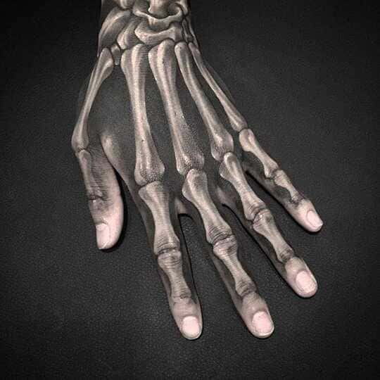 hand skeleton tattoo