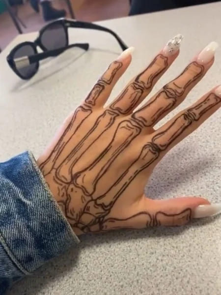 simple skeleton hand tattoo