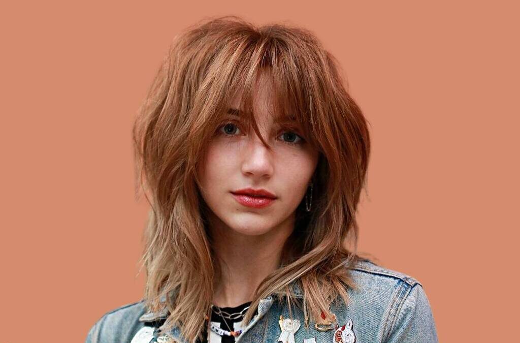 Shoulder Length Haircuts for Women with Layers and Bangs